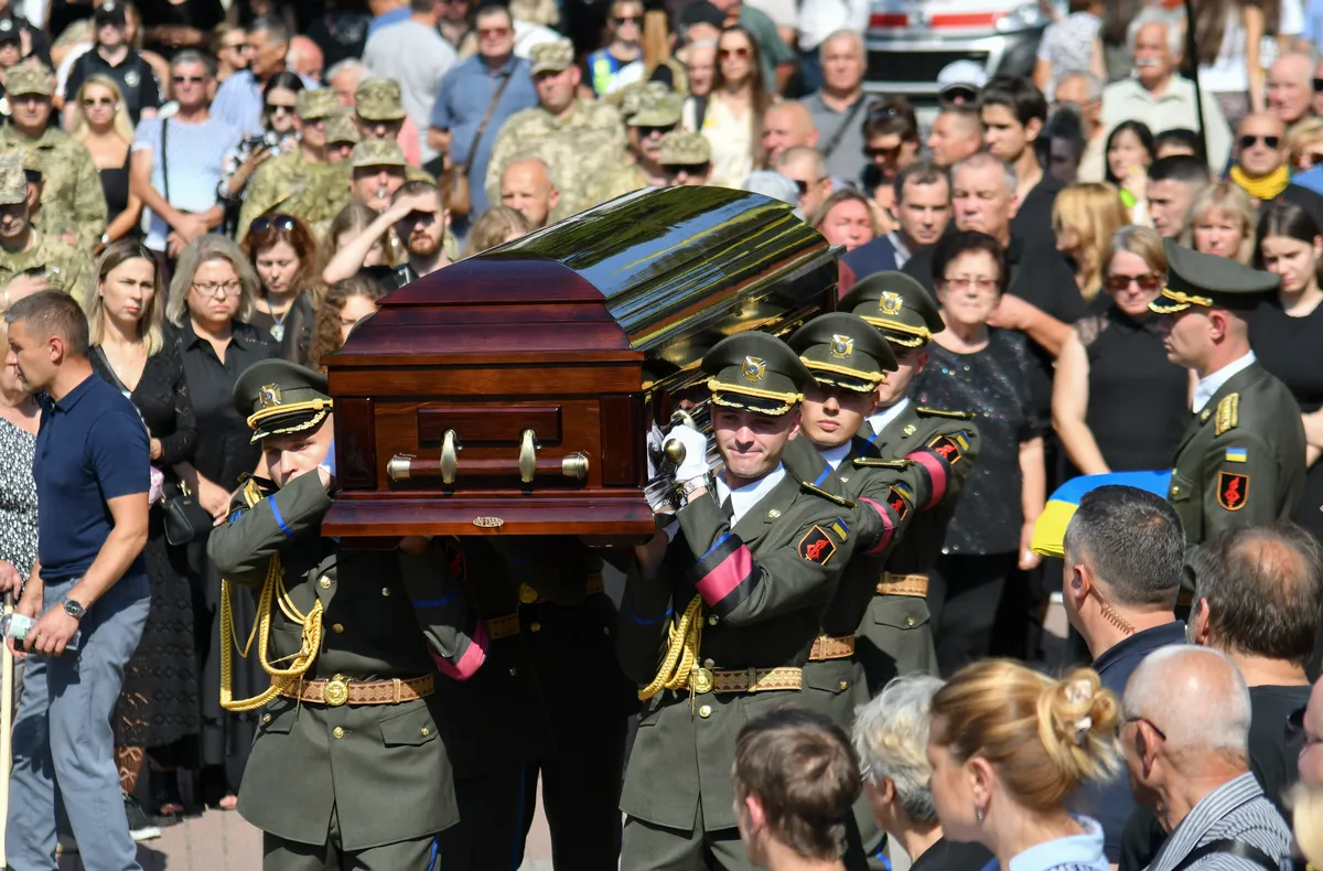 An honour guard bears Parubiy’s coffin through the streets of Lviv during his funeral, 2 September 2025. Photo: EPA / MYKOLA TYS