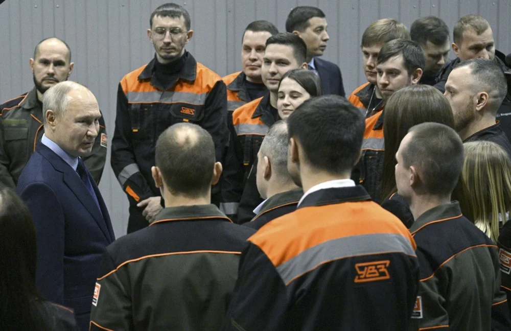 Vladimir Putin meets with staff members during a visit to Uralvagonzavod, the country’s largest producer of tanks, in Nizhny Tagil, Russia, 15 February 2024. EPA/RAMIL SITDIKOV / SPUTNIK / KREMLIN POOL