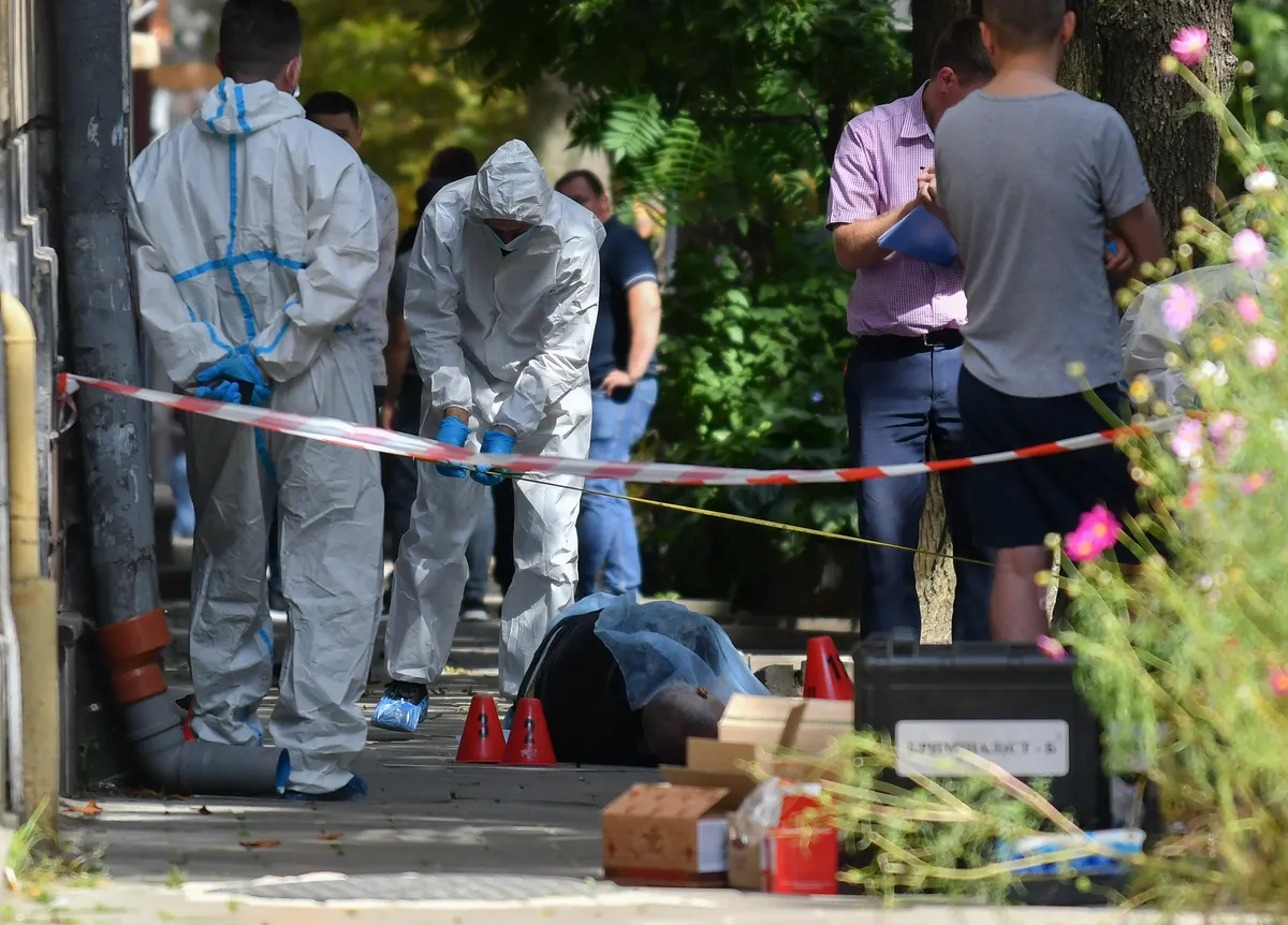 Ukrainian forensic experts work at the scene of Parubiy’s assassination in Lviv, western Ukraine, 30 August 2025. Photo: EPA/MYKOLA TYS