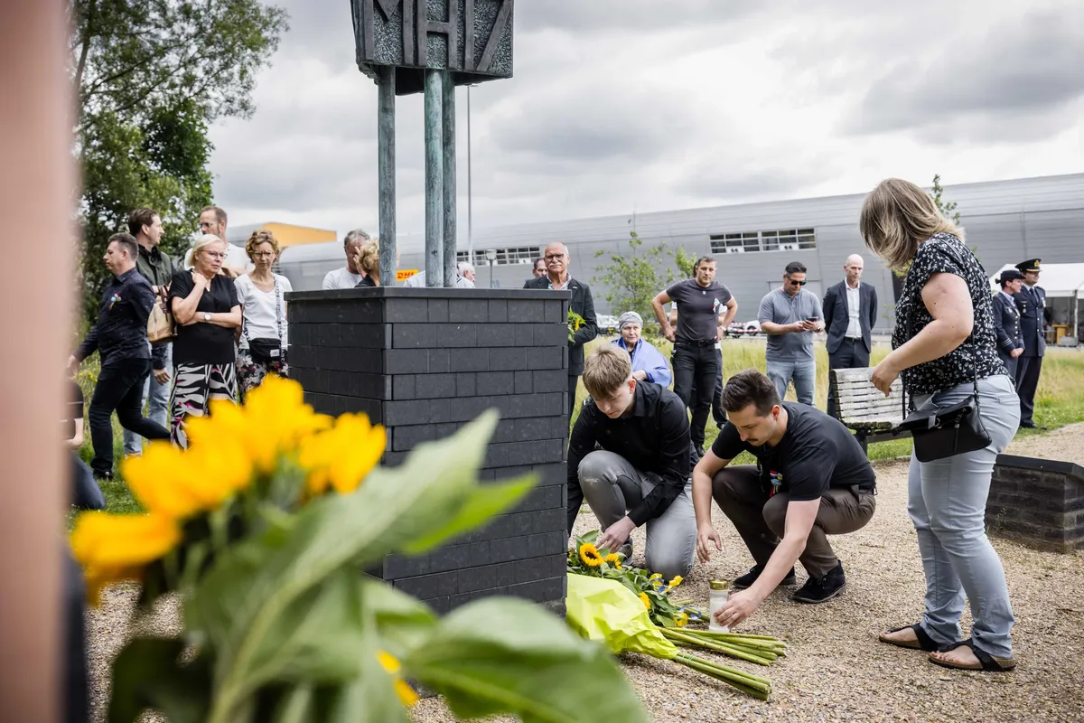 Relatives of victims lay flowers to the victims of the MH17 flight disaster at a memorial in Eindhoven, Netherlands, 23 July 2024. Photo: EPA/ROB ENGELAAR