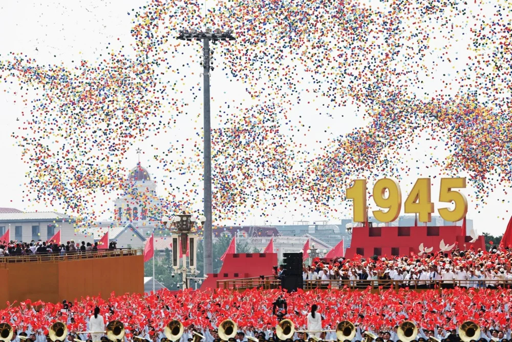 Balloons are released at a military parade marking the 80th anniversary of the end of the Sino-Japanese War in Beijing, China, 3 September 2025. Photo: EPA/ANDRES MARTINEZ CASARES